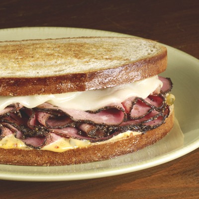 Hot pastrami melt on a plate