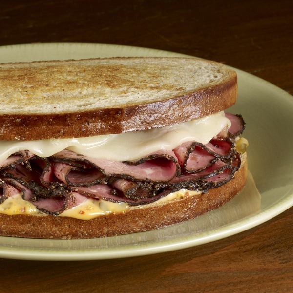 Hot pastrami melt on a plate