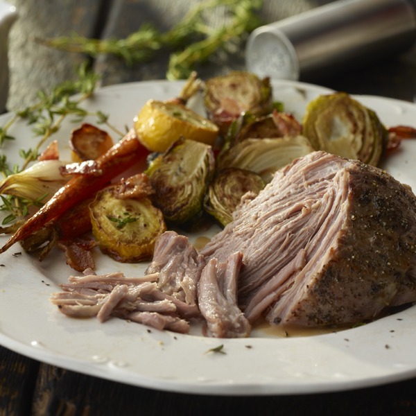 Balsamic pot roast on a plate with seasonal vegetables