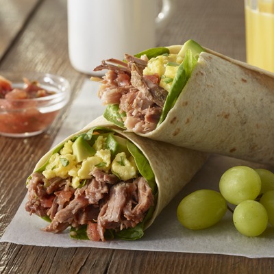 Pot roast breakfast burrito with a side of grapes