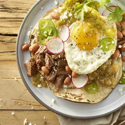 Pot roast huevos rancheros on a plate