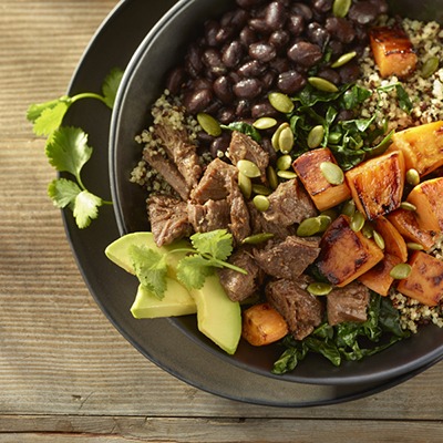 Pot roast beef bowl with black beans, quinoa, sweet potatoes, avocado, cilantro, and pumpkin seeds