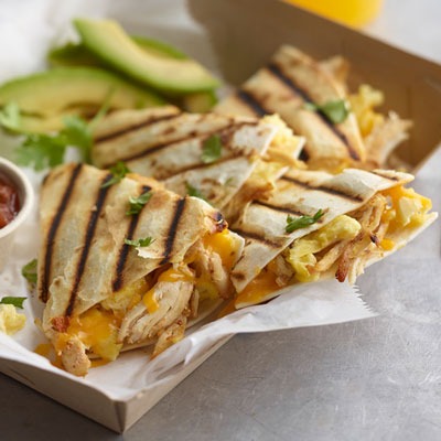 Pulled chicken breakfast quesadilla in a basket