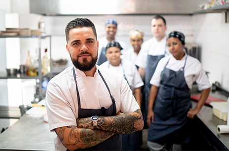 Group of chefs in kitchen